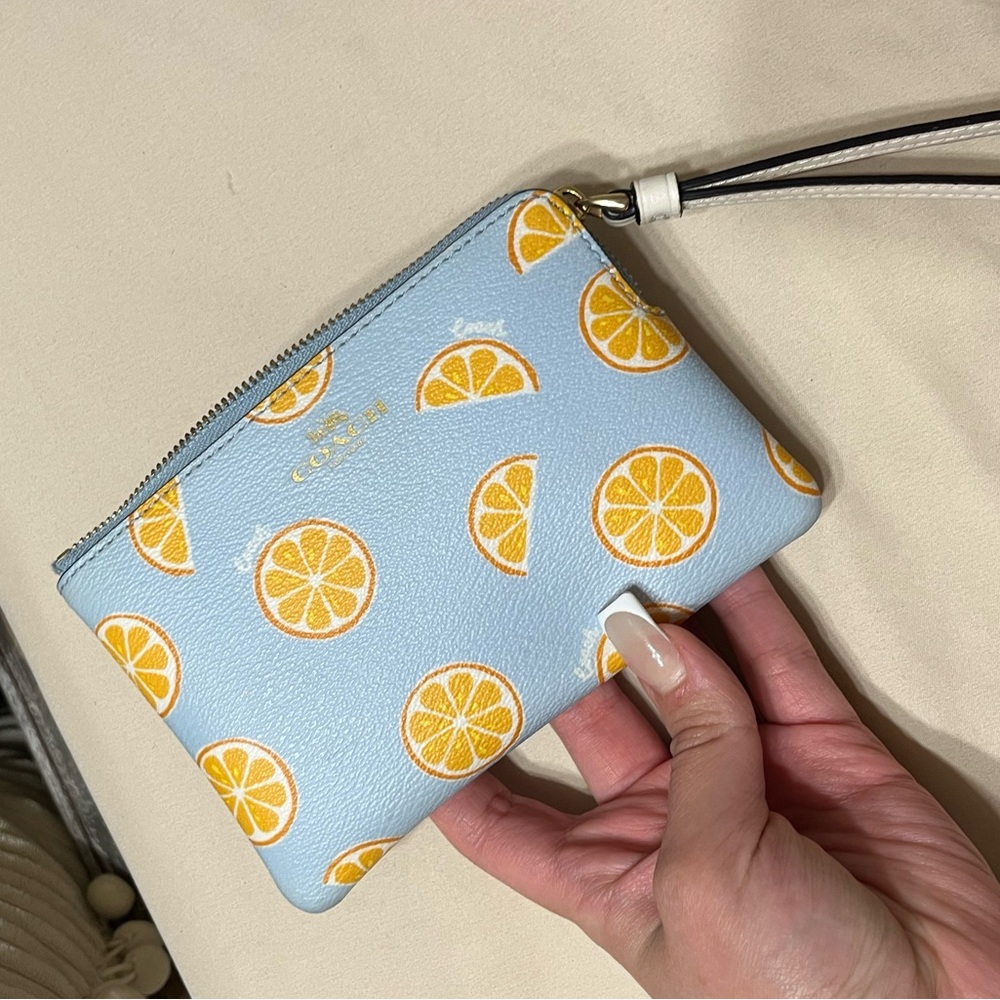 Coach oranges wristlet
